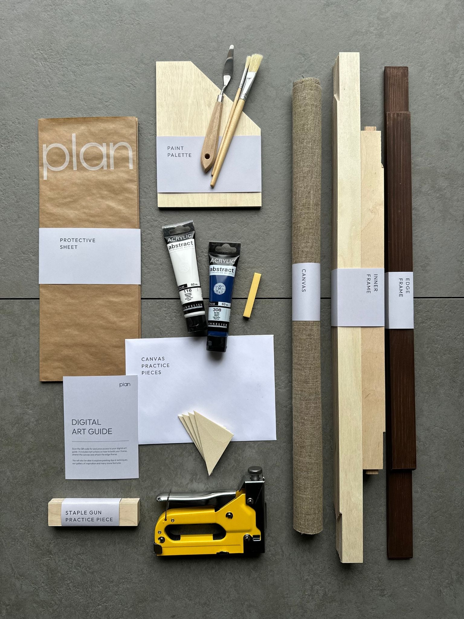 Plan No5 Art Kit, August Palette in frame size 50x70cm — see the contents included to create a bold, expressive artwork with navy, white, and a yellow soft pastel accent.