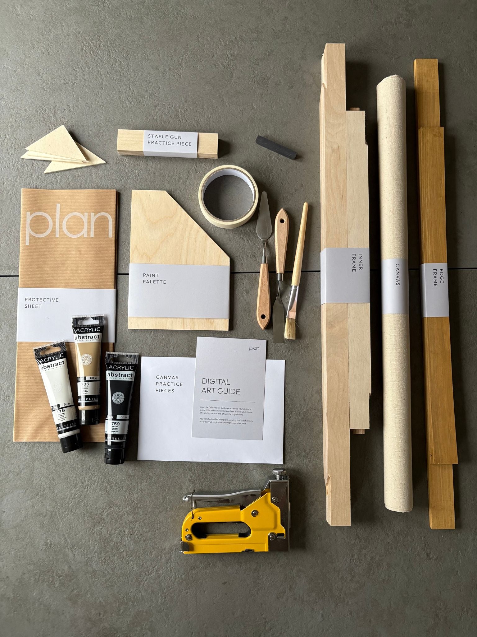 Minimalist DIY wall art kit UK – black, white and beige abstract canvas with oak frame, 50 × 70 cm. Make your own framed artwork with Plan art kits.