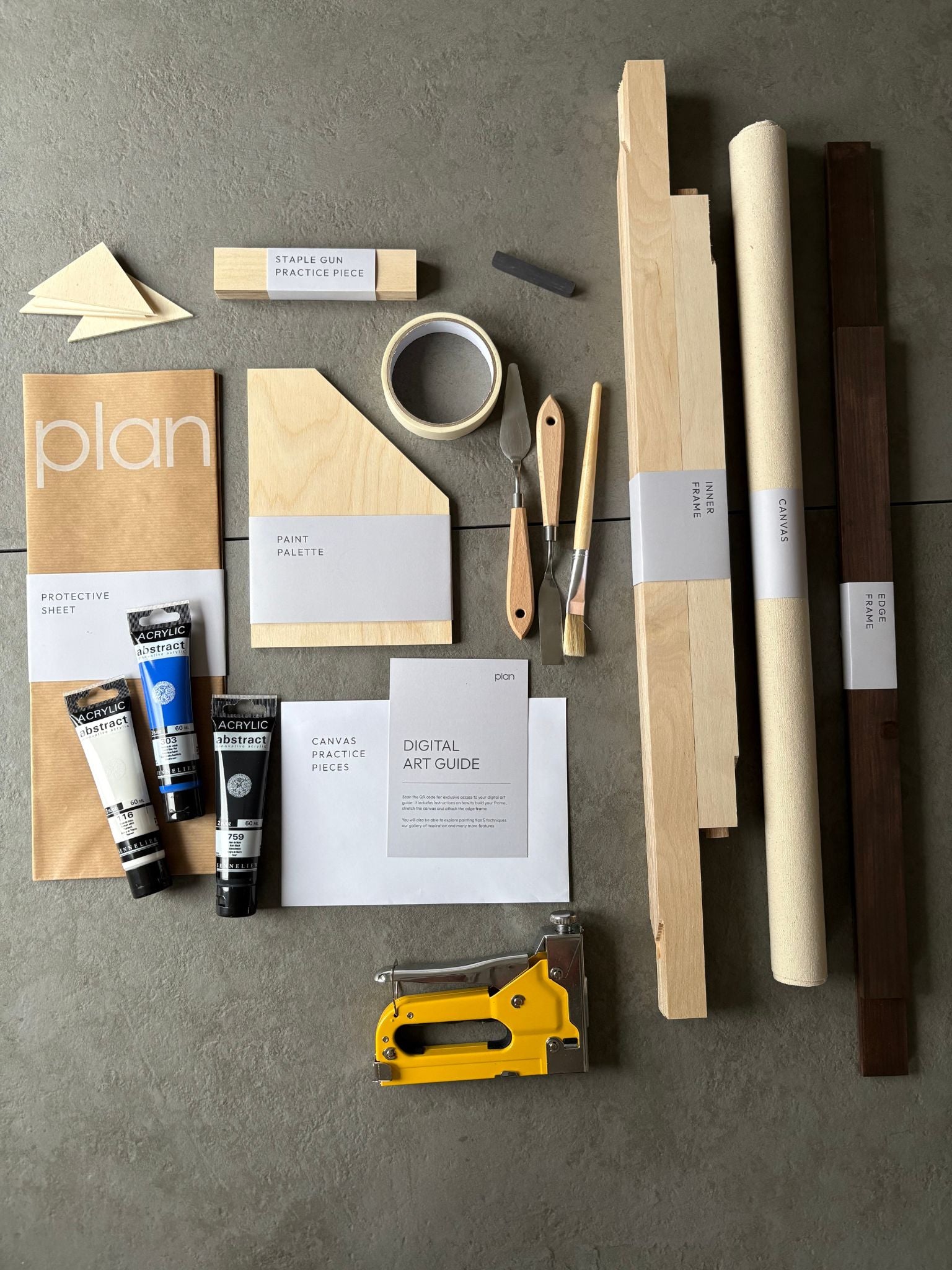 DIY abstract art kit UK – create your own black and white canvas with blue accent. Modern minimalist wall art kit with dark oak frame, 50 × 70 cm by Plan.