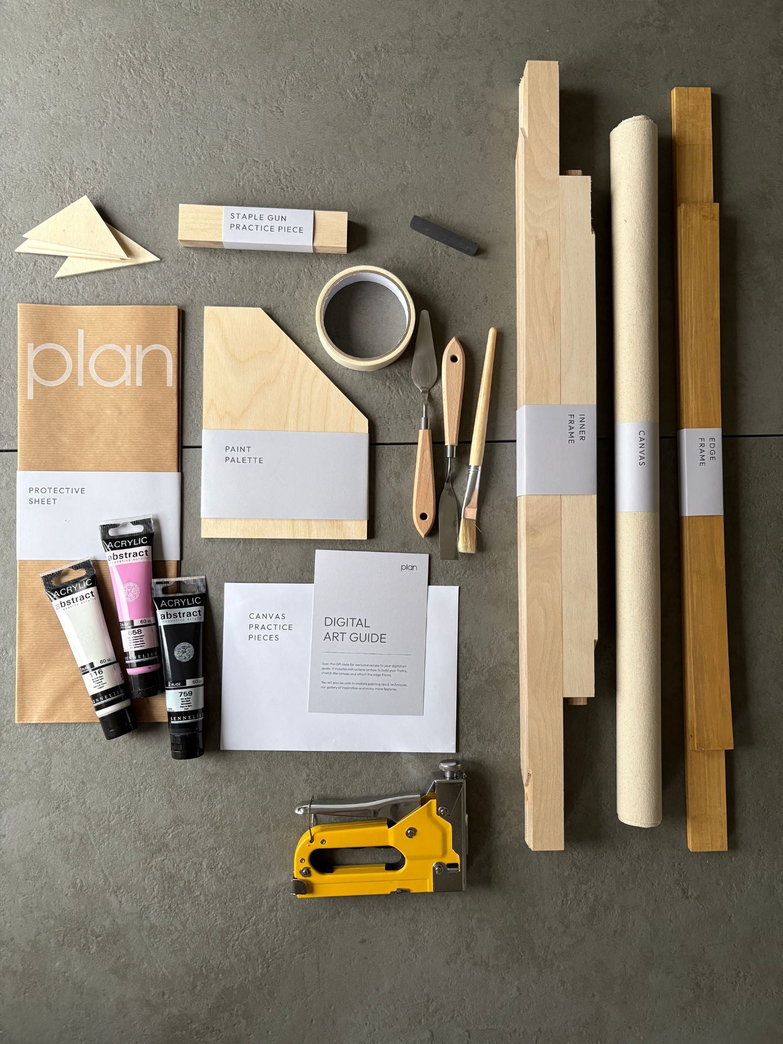 Modern DIY art kit UK – black and white canvas with pink accent and oak frame, 50 × 70 cm cotton canvas. Perfect creative gift idea by Plan.