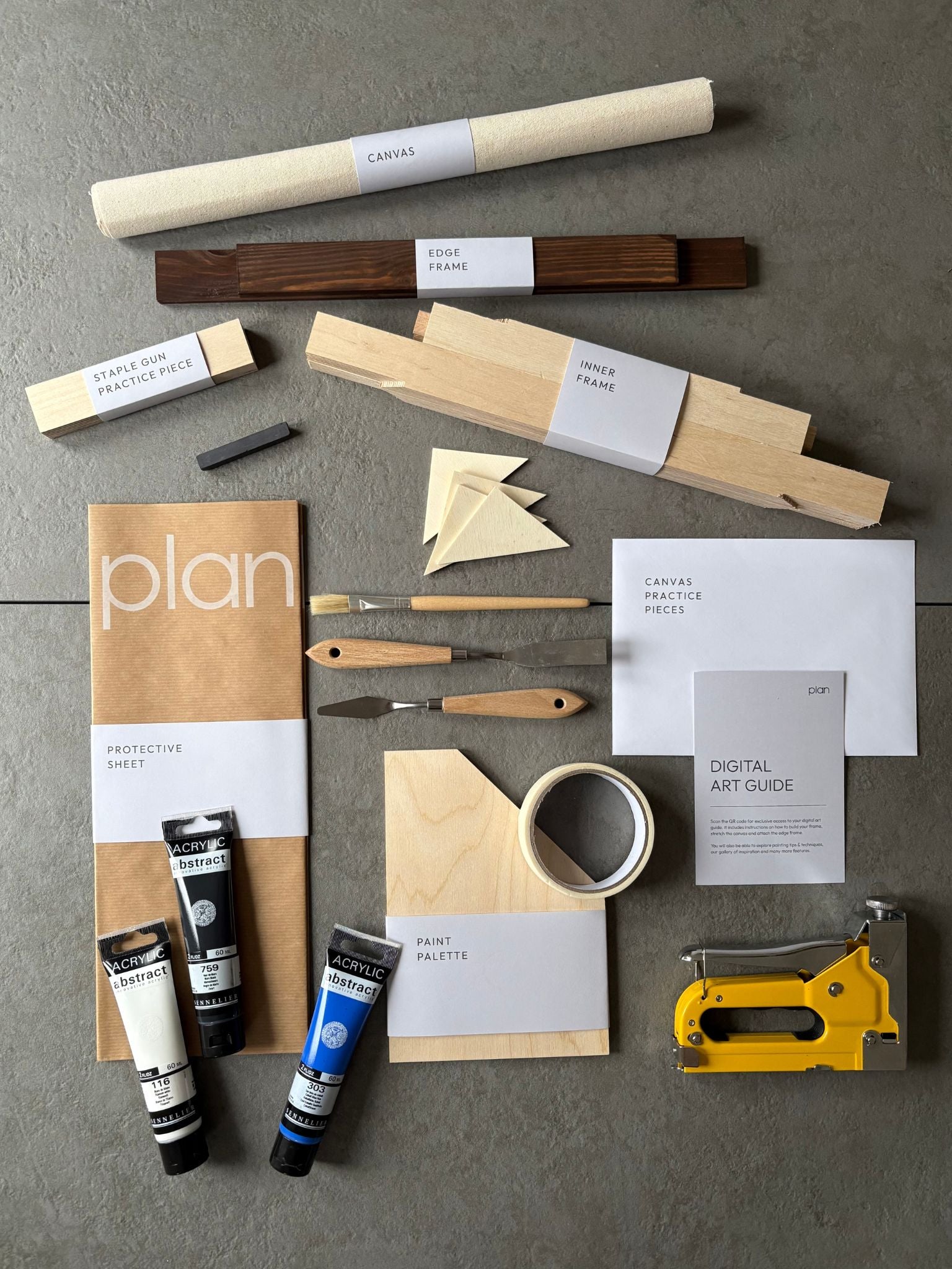 DIY abstract art kit in black, white, and blue tones framed in dark oak – Monochrome 01 by Plan, 30 × 40 cm cotton canvas. Minimalist DIY wall art UK.