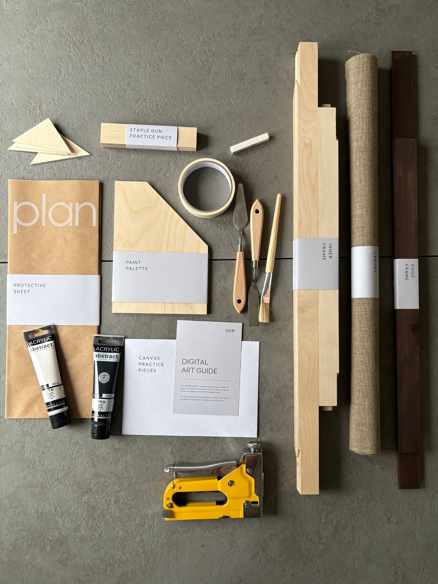 Black and white DIY wall art kit UK – 50 × 70 cm linen canvas with dark oak frame. Make your own framed minimalist artwork with Plan art kits, handcrafted in the UK.