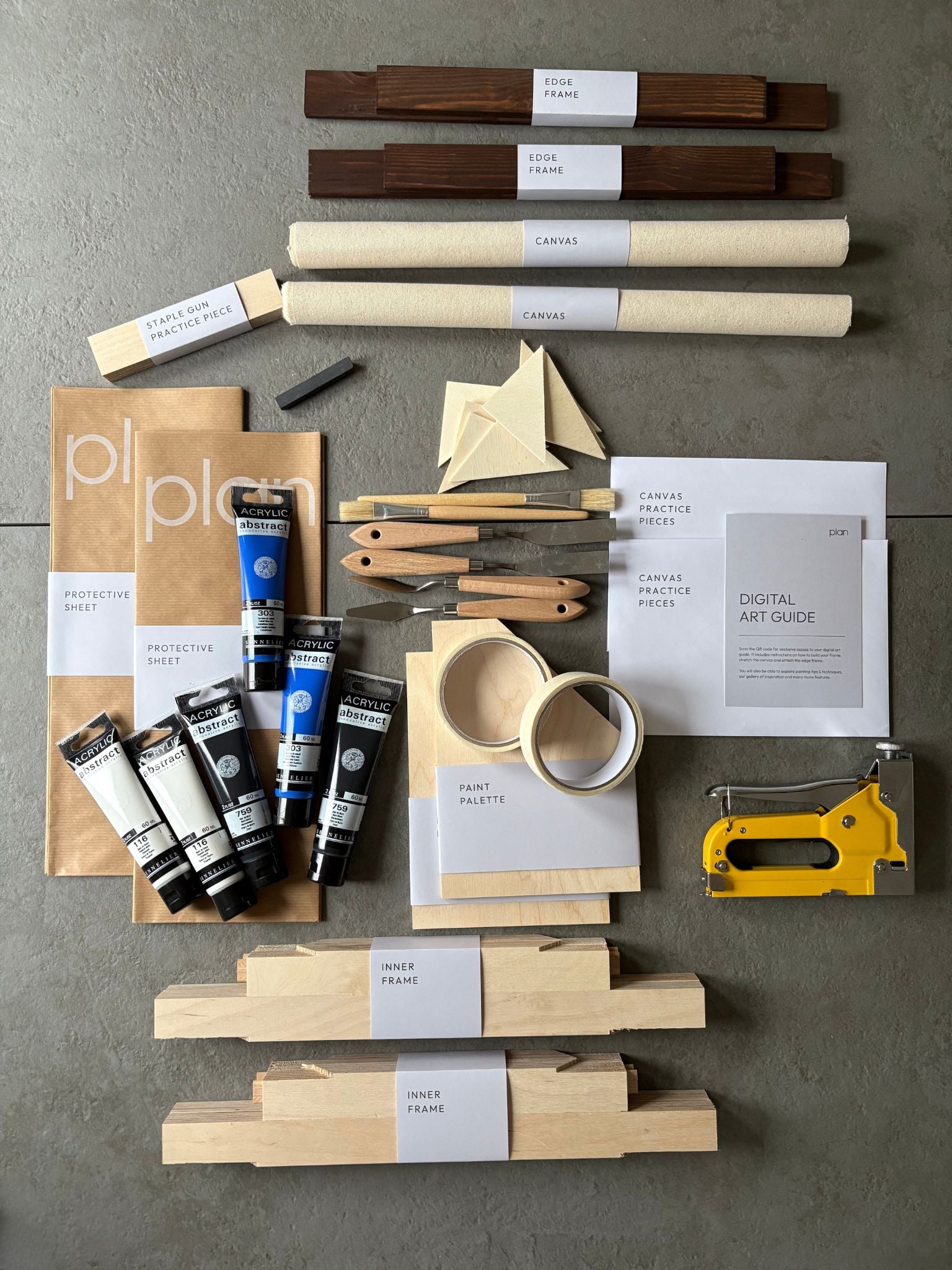 DIY double art kit UK – create two black and white abstract canvases with blue accent. 30 × 40 cm cotton canvas set with dark oak frames by Plan. Modern minimalist wall art kit for home decor and creative gifts.