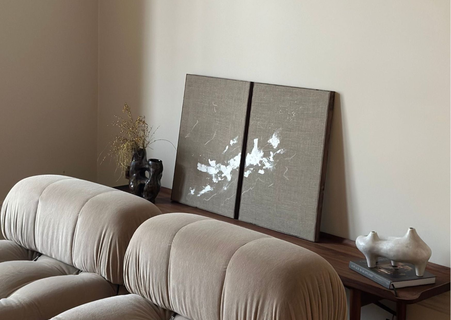 Two framed abstract artworks created using a Plan Double Art Kit in Monochrome colour palette with raw linen canvas, styled in a modern UK living room. DIY art kit for creating two gallery-style artworks at home.