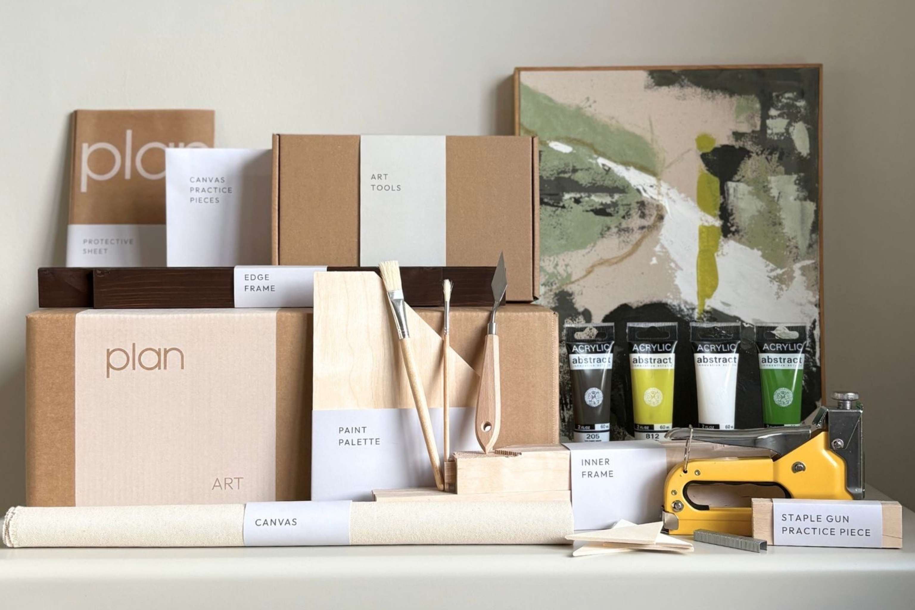 DIY art kit by Plan Art Kits showing frames, canvas, paints and tools to make your own framed artwork at home. Complete art kit designed for creating gallery-style wall art in the UK.