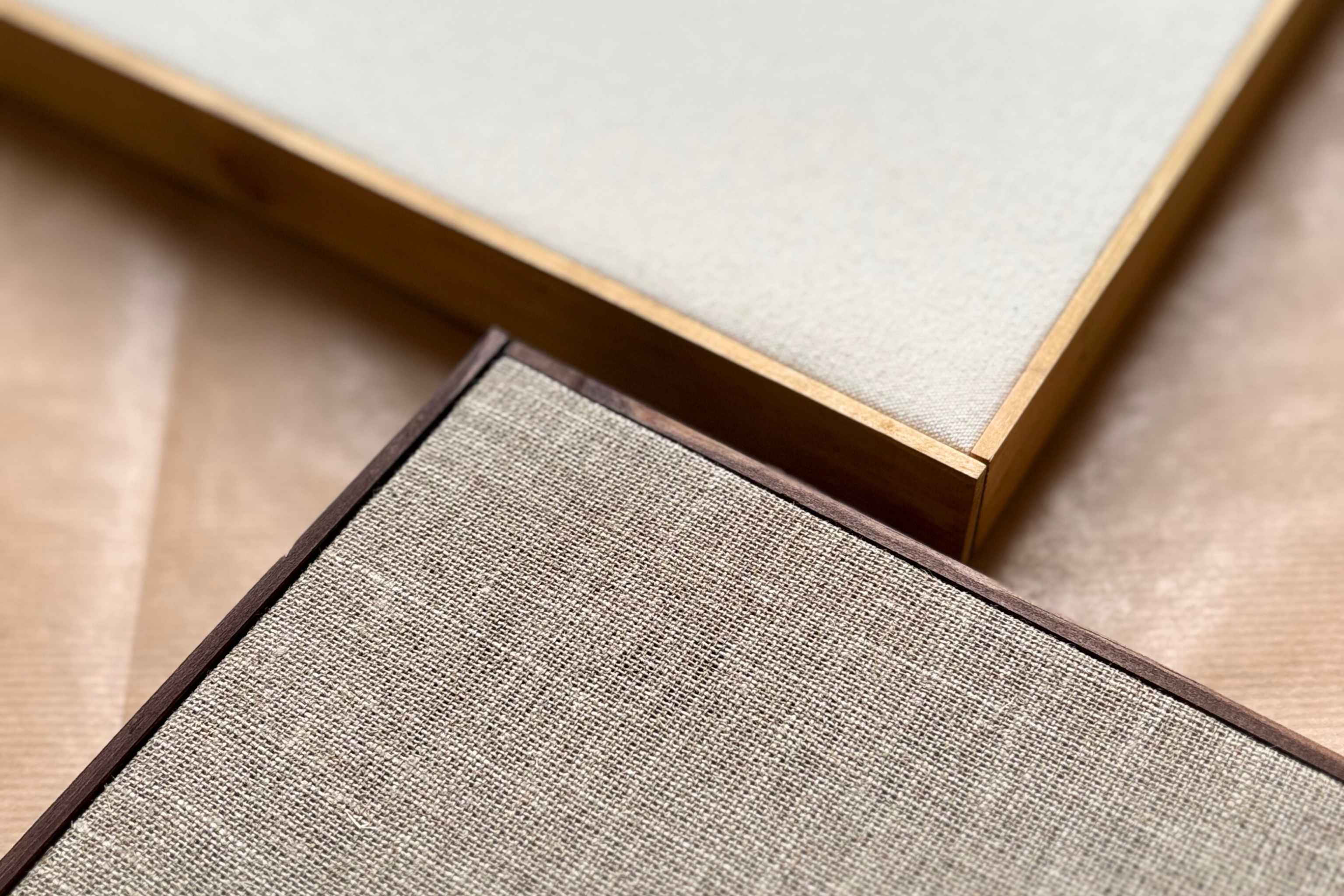 Close-up of framed canvas corners with oak and dark oak edge frames from a Plan DIY art kit, highlighting the handcrafted frame quality that makes it a meaningful creative gift