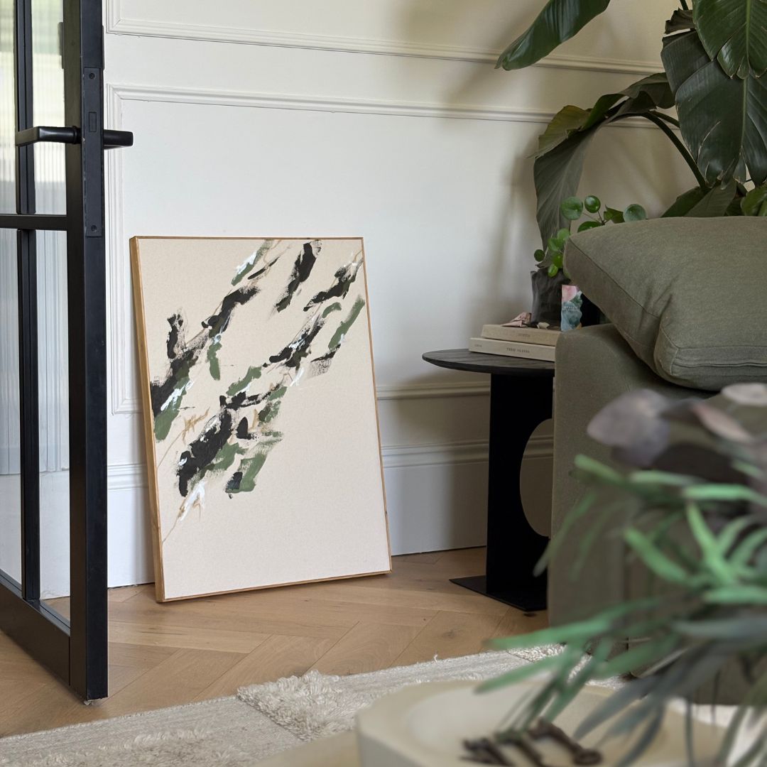 Completed framed canvas artwork created with a DIY art kit, styled in a calm home interior setting.