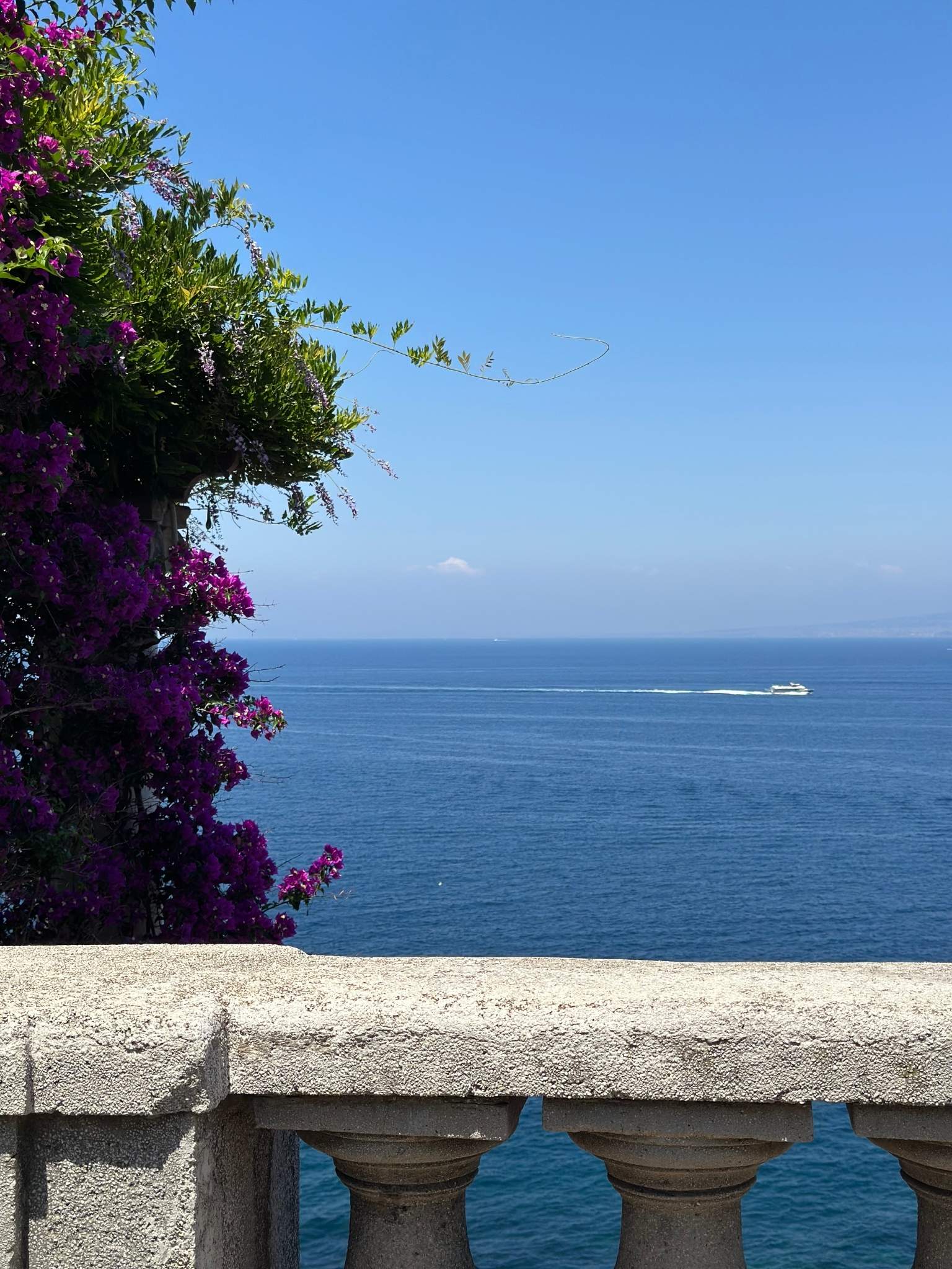 Deep blue sea with bright floral accents and clear sky, capturing the contrast and intensity behind the Primary Colours framed canvas art kit palette.