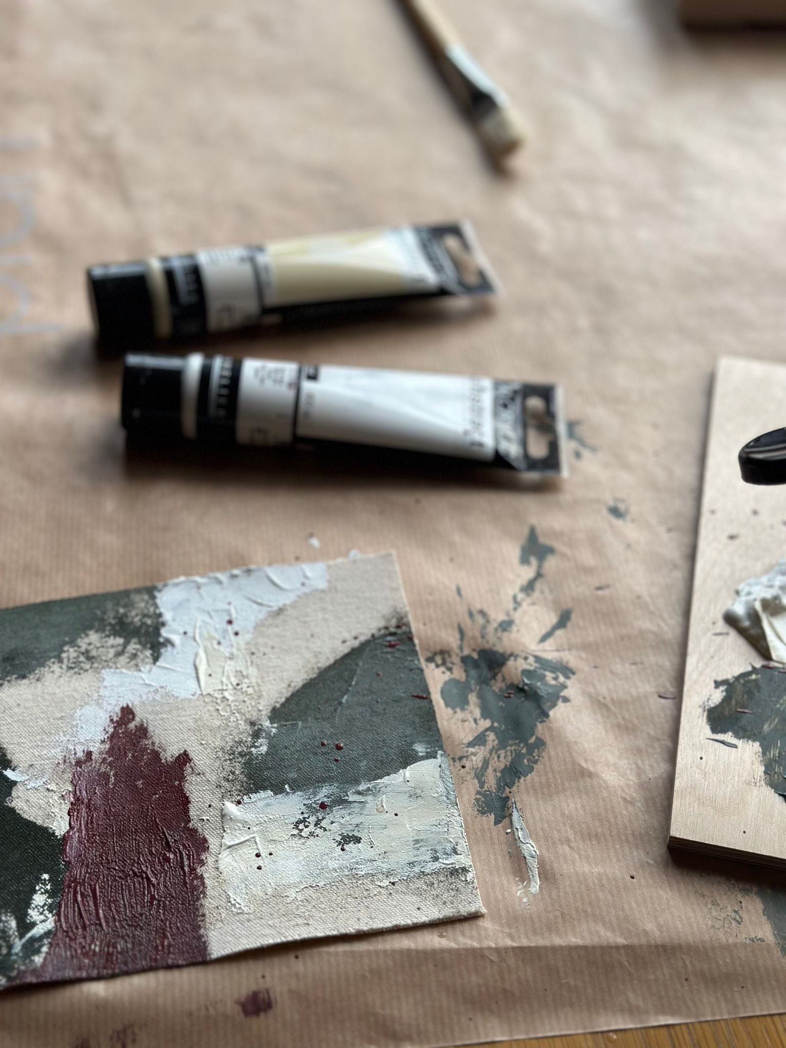 Close-up of abstract painting in progress using forest red colour palette, DIY canvas artwork created with the Forest Red framed canvas art kit and acrylic paints