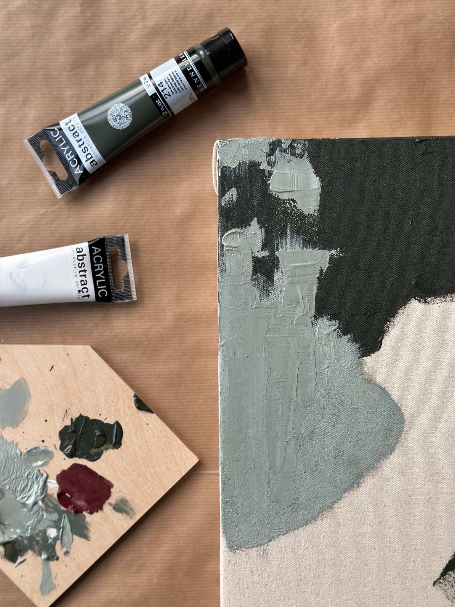 Abstract canvas painting detail in forest red and green tones, DIY artwork made with the Forest Red framed canvas art kit using textured acrylic paint