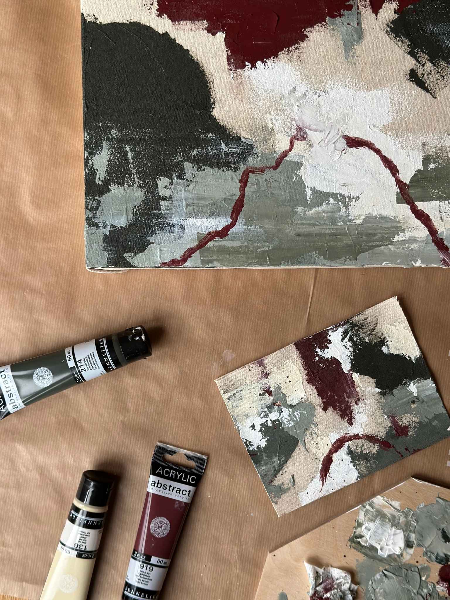 Forest red abstract painting process with acrylic paints and palette, DIY artwork created using the Forest Red framed canvas art kit on raw canvas