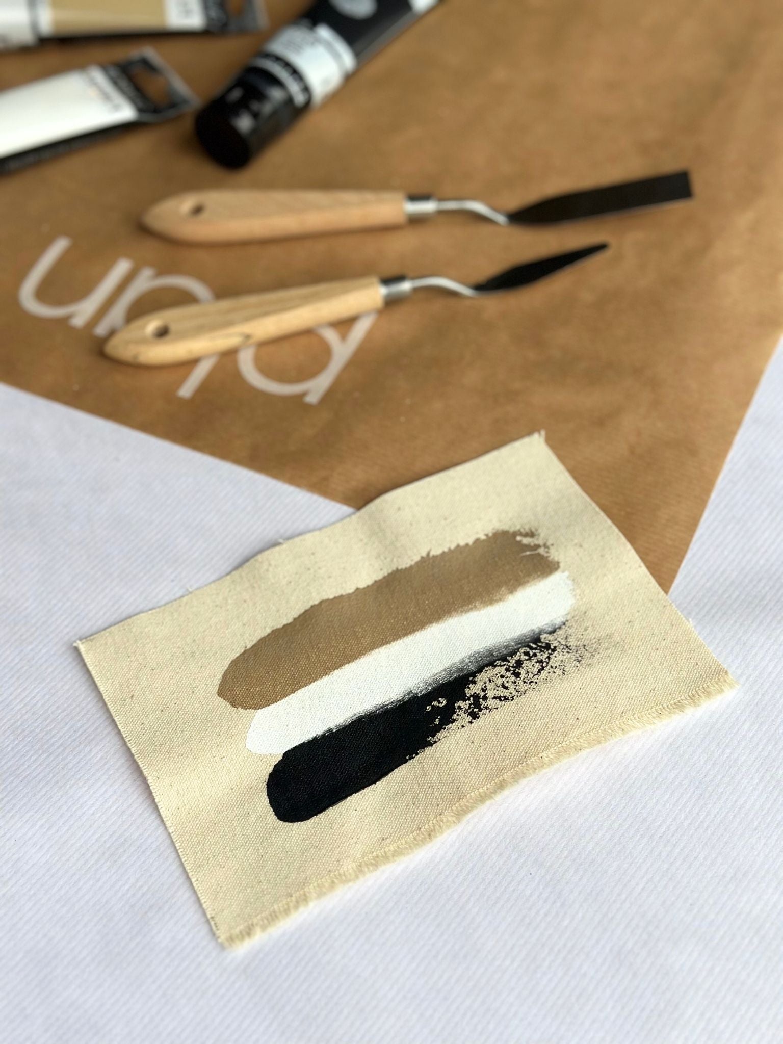 Monochrome colour palette swatch for Plan framed canvas art kit on cotton canvas, featuring black, white and soft beige acrylic paints