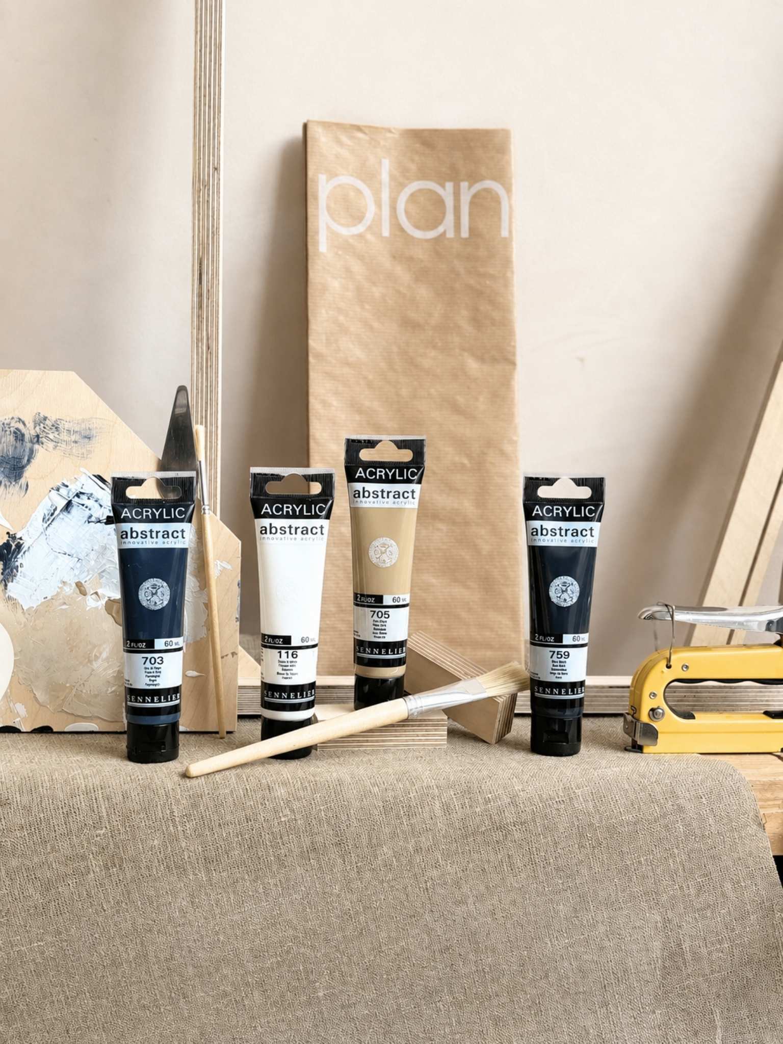 DIY framed canvas art kit with Monochrome linen canvas palette, acrylic paints, artist tools, linen fabric and Plan packaging.