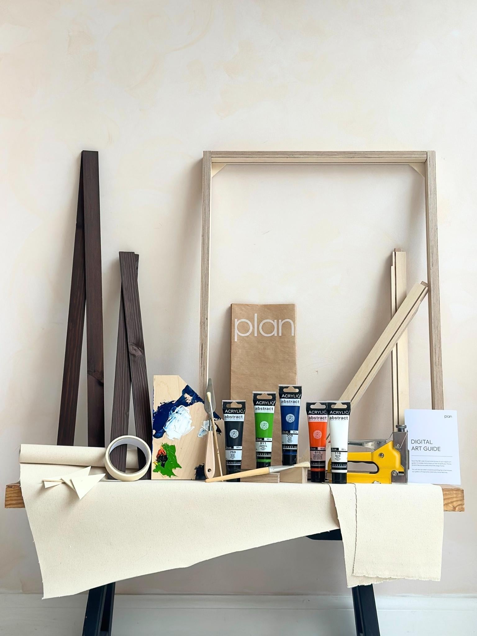 Large framed canvas art kit in navy and bright accents colour palette, DIY wall art kit with dark oak edge frame, custom inner frame, canvas, paints and tools included.