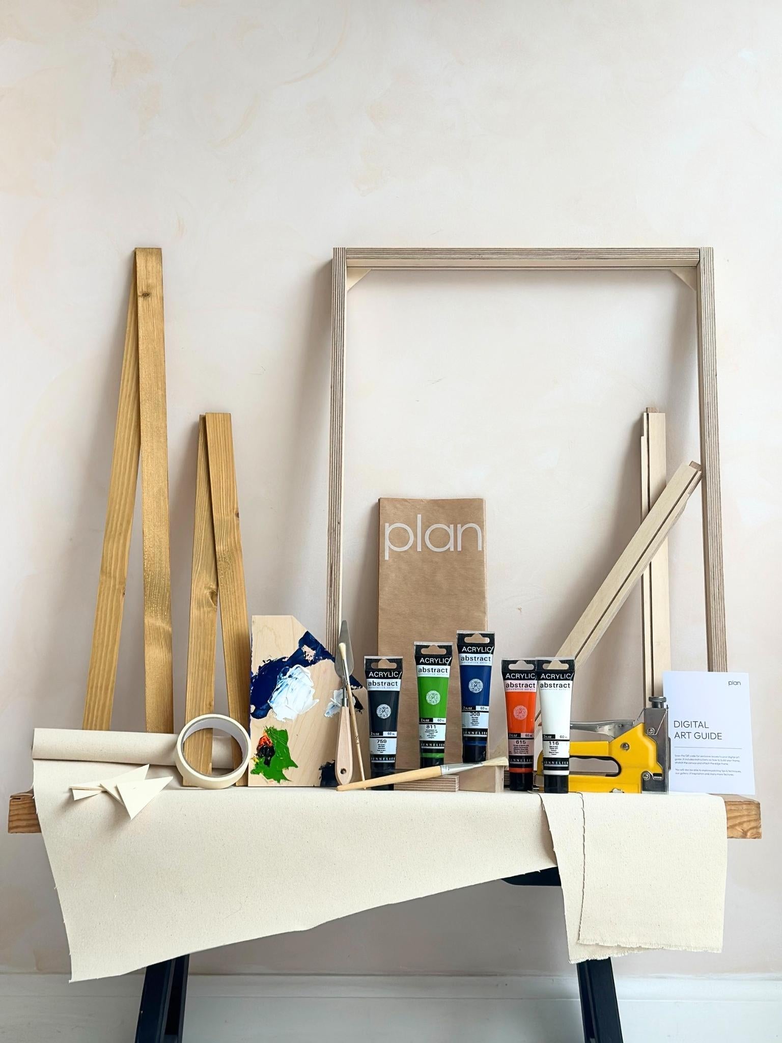 Large DIY framed canvas art kit in navy and bright accents colour palette, single large canvas artwork with oak edge frame, includes paints, canvas, inner frame and painting tools.