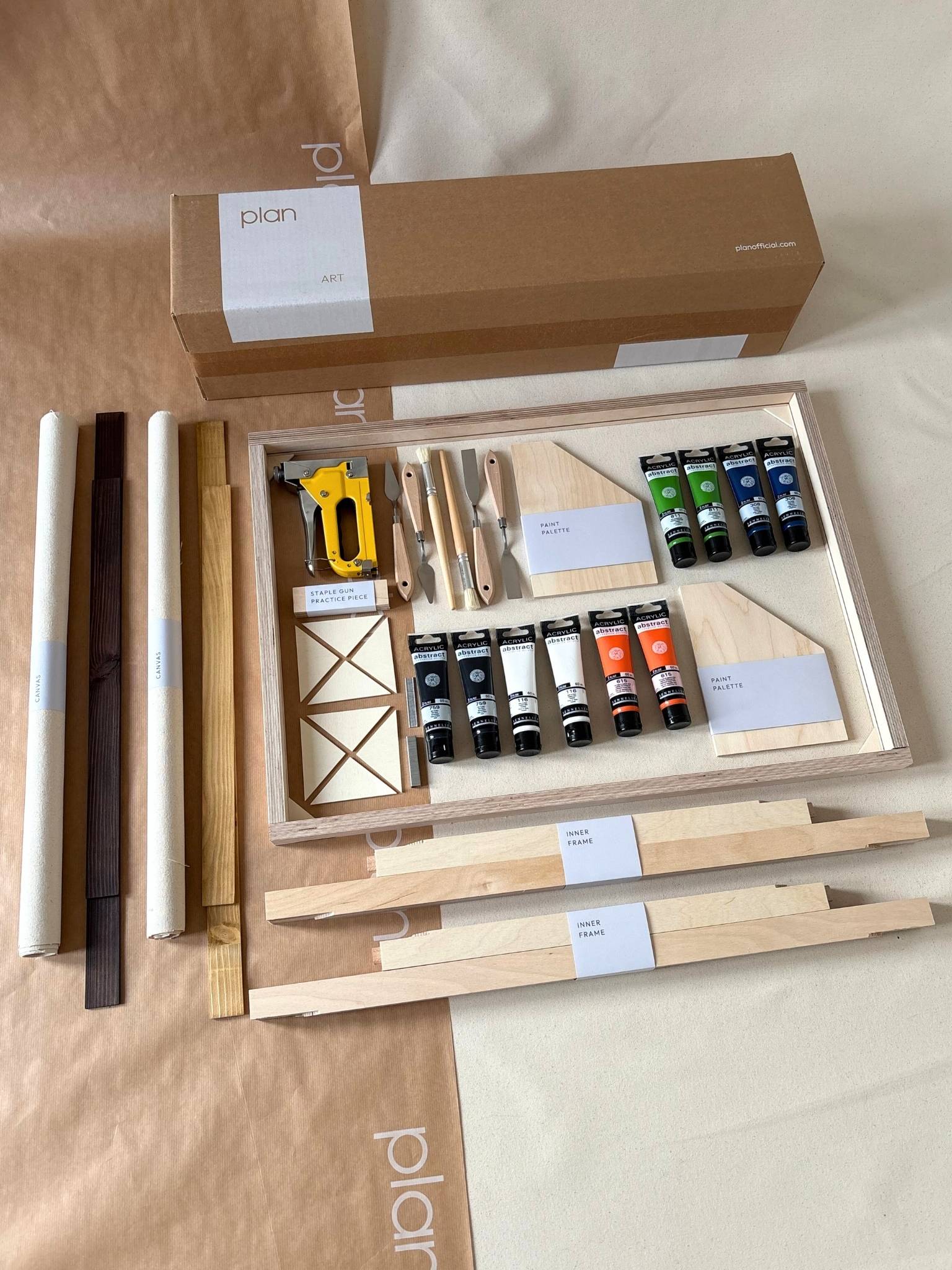 Double framed canvas art kit in navy and bright palette, two large canvases with mixed oak and dark oak edge frames, includes paints, frames and tools