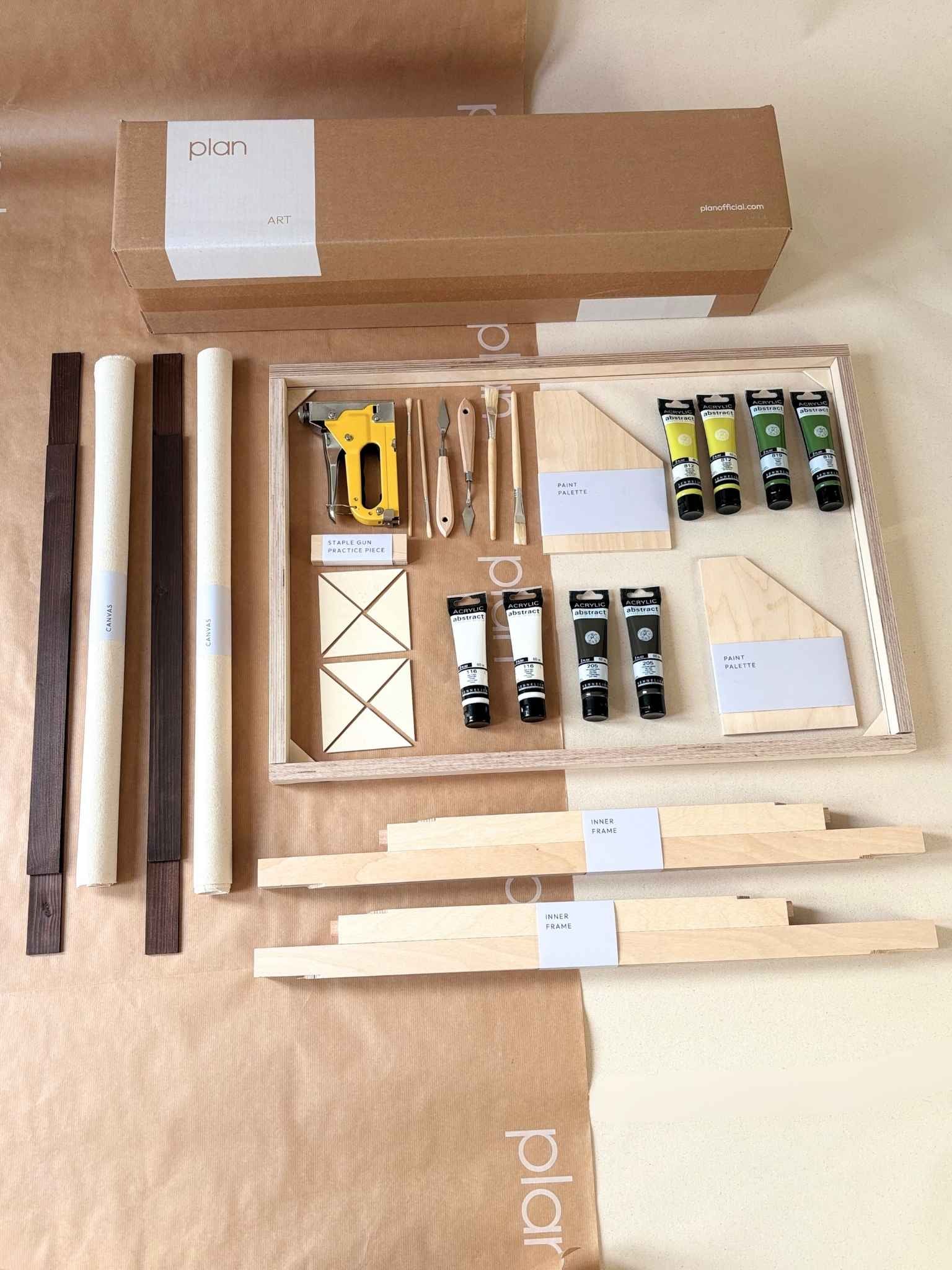 Everything you need to create two framed abstract artworks at home. Olive double framed canvas art kit with cotton canvases, premium acrylic paints, tools and handcrafted dark oak edge frames