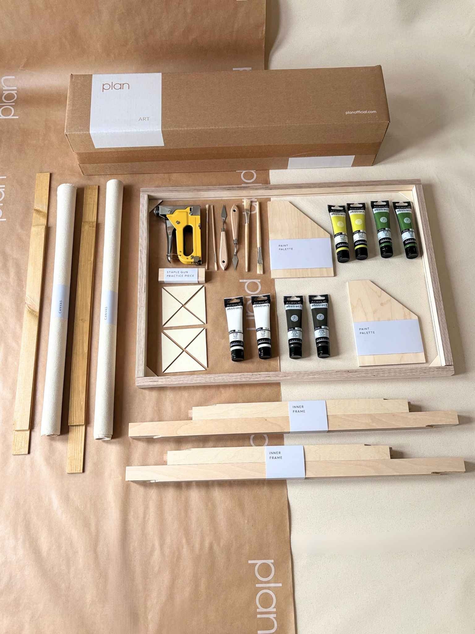 DIY framed canvas art kit for adults. Olive double art kit with two cotton canvases, curated green and neutral paint palette, tools included and oak edge frames