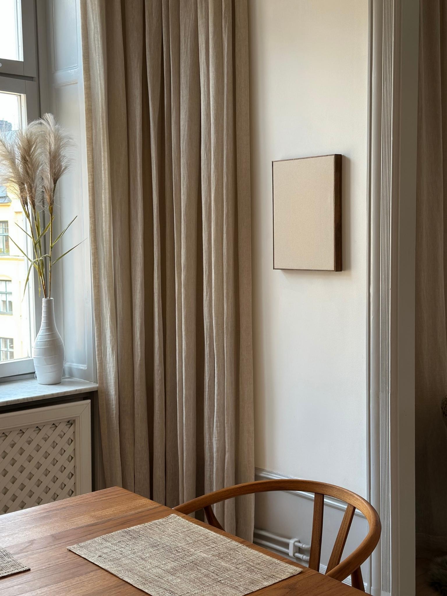 Framed cotton canvas artwork displayed on a dining room wall with soft neutral styling, created using a DIY cotton canvas art kit