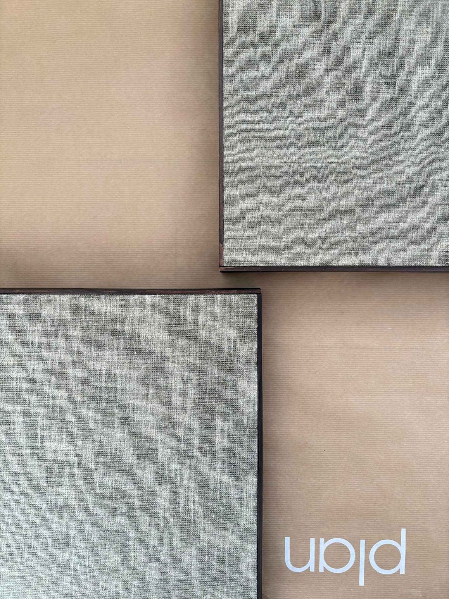 Close-up of a finished framed linen canvas with dark oak edge frame, highlighting the premium linen texture and handcrafted frame detail from a DIY framed linen canvas art kit.