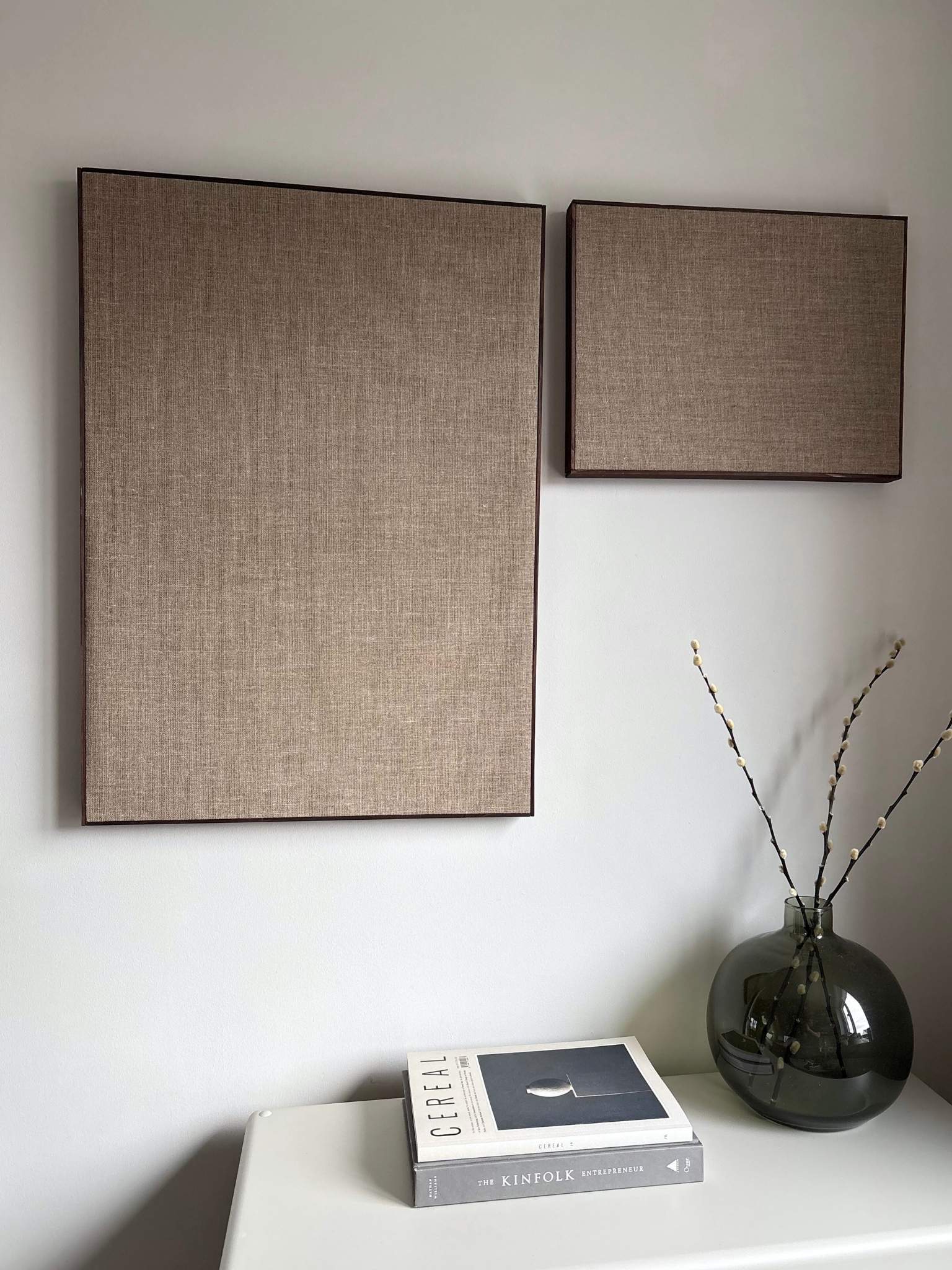 Two framed linen canvases displayed together as a matching pair hangin on a wall, demonstrating the outcome of a double framed linen canvas art kit